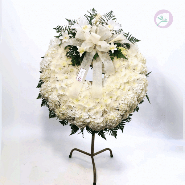 Corona funebre para condolencias en - Floristería Hojas Blancas