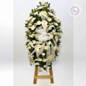 Un delicado ramo de flores exequiales elaborado con fully y anturios, diseñado para expresar condolencias y rendir un sentido homenaje a la memoria de quien ha partido.  La elegancia de los anturios y la belleza del fully se unen en un arreglo floral lleno de significado y respeto.