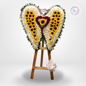 Un homenaje lleno de paz y significado. Nuestro arreglo fúnebre Alas de Despedida está diseñado en forma de alas, simbolizando el descanso eterno, la protección y el amor que permanece incluso después de la partida.